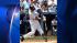 New York Yankees Derek Jeter follows through on...