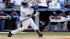 New York Yankees Derek Jeter follows through on...