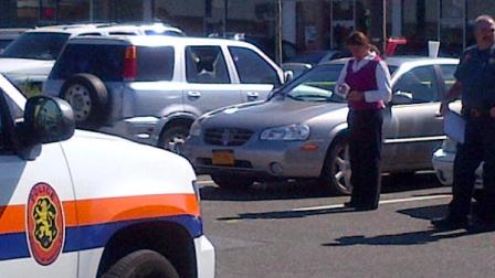 Police on the scene of a stabbing where two people were wounded in Massapequa on Tuesday, Sept. 25, 2012.