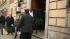 Lindsay Lohan leaves the 10th Precinct, her face...