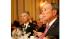 NYC Mayor Michael Bloomberg listens to the...