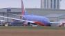 southwest plane stuck in mud