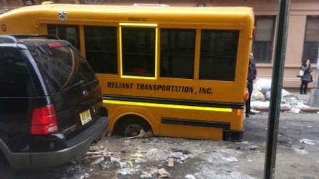 mini school bus in sinkhole