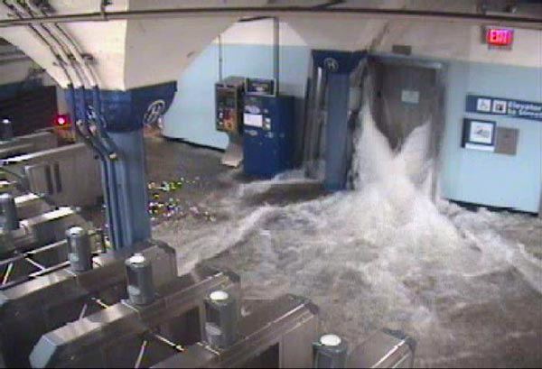 Flood waters rush in to the Hoboken PATH station through an elevator shaft during hurricane Sandy, on Monday, Oct. 29, 2012.