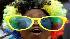A South African fan, cheers as she watches through a giant screen the World Cup group A match between South Africa and Mexico at the beach of Durban, South Africa, Friday, June 11, 2010.