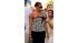 U.S First Lady Michelle Obama smiles while she...