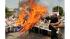 Pakistani lawyers burn a U.S. flag while...