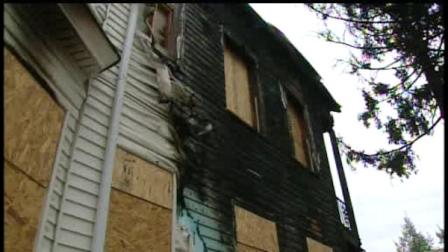 Five people jumped out the second floor windows to escape a burning home in Paterson