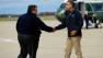 President Barack Obama is greeted by New Jersey Gov. Chris Christie upon his arrival at Atlantic City International Airport, Wednesday, Oct. 31, 2012, in Atlantic City.