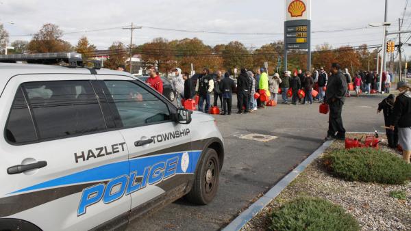People cue up at the Shell station on Route 35 in Hazlet, N.J. for gasoline, Thursday, Nov. 1, 2012.