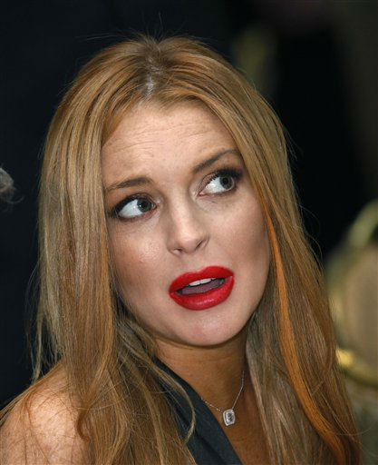 Lindsay Lohan leaves the 10th Precinct, her...