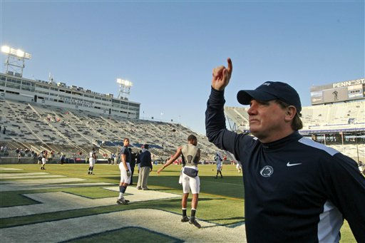 Penn State assistant coach Jay Paterno waves...