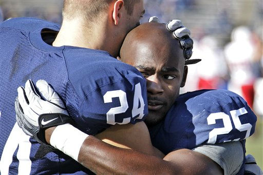 Penn State players Derek Moye (6), Quinn Barham...