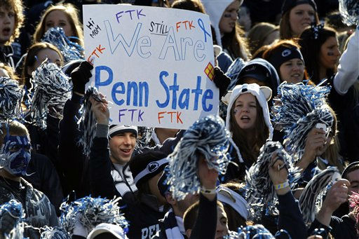 Penn State assistant coach Jay Paterno waves...