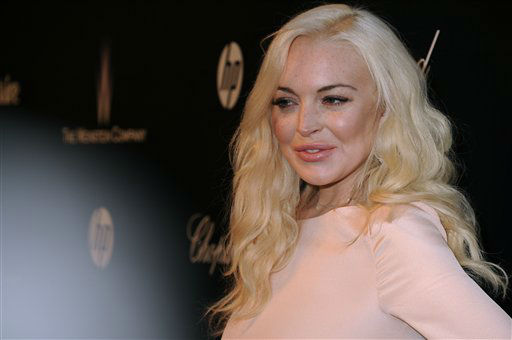 Lindsay Lohan leaves the 10th Precinct, her...