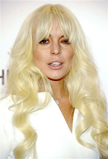 Lindsay Lohan leaves the 10th Precinct, her...