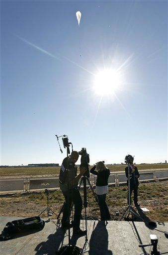 The capsule and attached helium balloon...