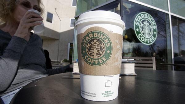 A Starbucks customer drinks coffee in Palo Alto, Calif., Tuesday, Feb. 26, 2008.