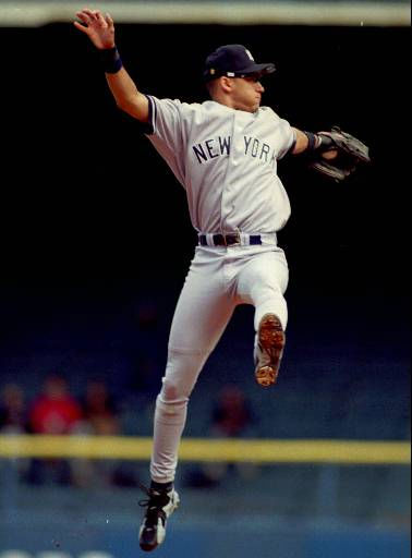 New York Yankees Derek Jeter follows through on...