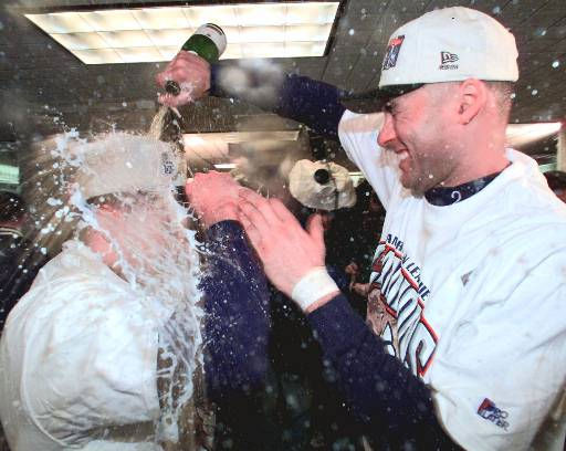 New York Yankees Derek Jeter follows through on...