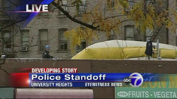 A man accused of stabbing a woman is engaged in a standoff with police.