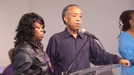 The Rev. Al Sharpton at a rally in Harlem with the mother of Tamon Robinson