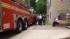 Firefighters rush into a burning apartment in... ::