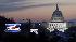 The U.S. Capitol is brightly illuminated early...