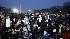 People wait on the National Mall in Washington...