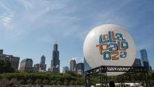 (FILE) A Lollapalooza balloon floats between stages at the Lollapalooza Festival in Chicago in June 2013. - Provided courtesy of AP Photo/Scott Eisen, File