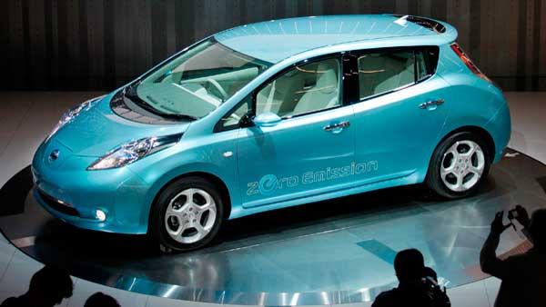 Nissans new electronic vehicle, the Leaf, is displayed during an opening ceremony of the companys new headquarters in Yokohama, Japan, Sunday, Aug. 2, 2009. It was the first time the external design was shown of Nissan Motor Co.s environmentally friendly automobile, set to go on sale in Japan, the U.S. and Europe next year. Nissan has promised that the Leaf, which goes into mass production as a global model in 2012, will be about the same price as a gas-engine car such as the 1.5 million yen ($15,000) Tiida, which sells abroad as the Versa, starting at about $10,000. (AP Photo/Itsuo Inouye)