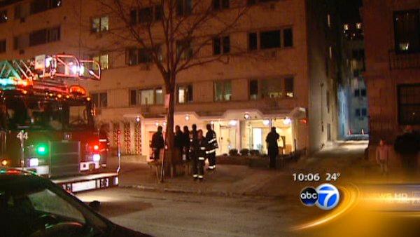 Fire in a North Side apartment building critically injured an 84-year-old woman on Friday night.