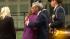 Chicago Mayor Rahm Emanuel hugs a member of a...