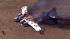 A WWII bomber plane crashed and caught fire in...