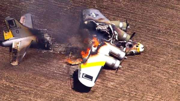 A WWII bomber plane crashed and caught fire in far west suburban Oswego Monday morning, June 13, 2011. (Chopper 7 HD image)