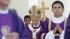 Pope Benedict XVI walks with his pastoral staff...