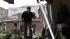 A Kaufman constable searches a home for persons...