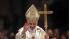 Pope Benedict XVI blesses faithful at the end of...