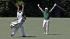 Louis Oosthuizen, of South Africa, and his...