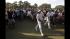 Bubba Watson watches his shot from the rough off...