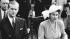 Princess Elizabeth, right, with her husband, the Duke of Edinburgh, are shown at the metropolitan police horse show at Imber Court, June 25, 1948, Thames Ditton, Surrey, England. (AP Photo)