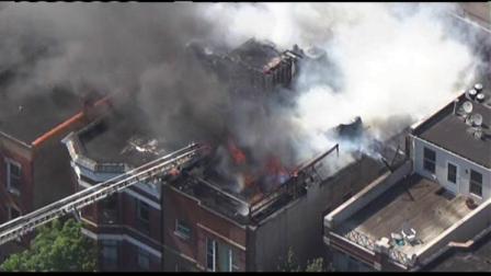 Chicago Fire Department crews battled a fire on the roof of a building in the 1400-block of West Erie, Friday, June 15, 2012.