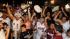 Miami Heat fans celebrate the Heat win against...