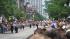 Chicago Police walk the parade route fence at...