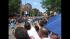 Pride Parade spectators take out their cameras...