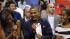 President Barack Obama dances to the music with...