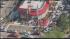 Throngs of people lined up outside the...