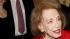Helen Gurley Brown greets singer Michael...