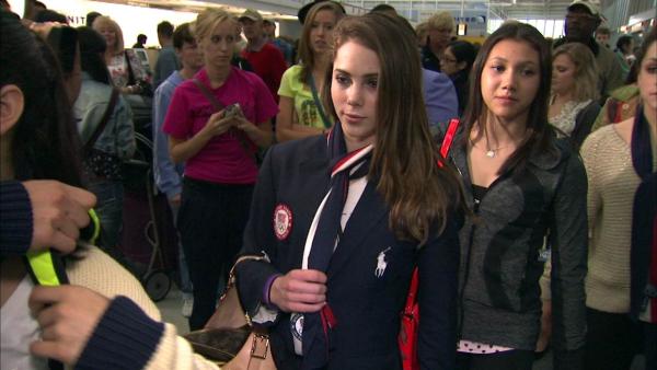 McKayla Maroney greets fans at O'Hare Airport, Monday, August 13, 2012.