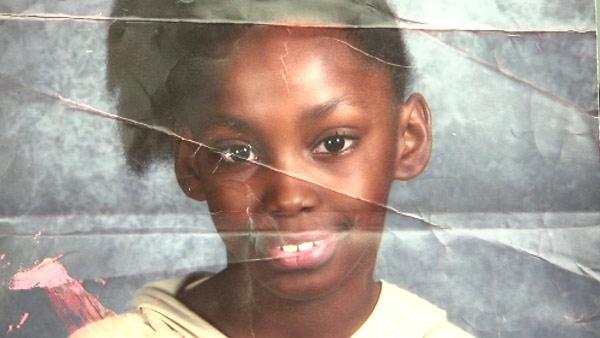 12-year-old hit by bullet while doing homework